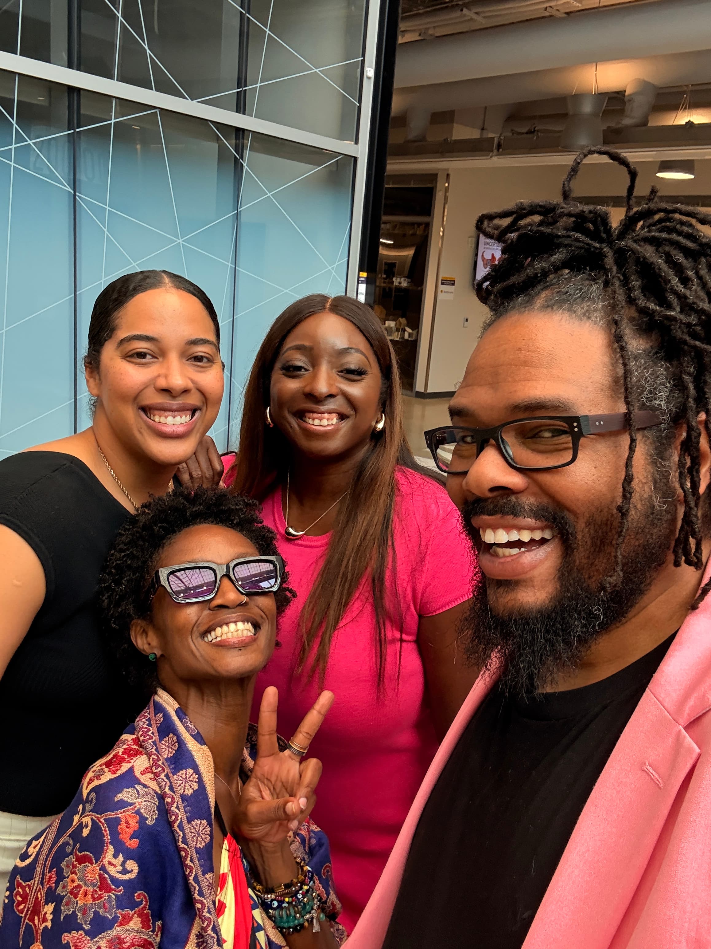 Joyful group selfie with community members