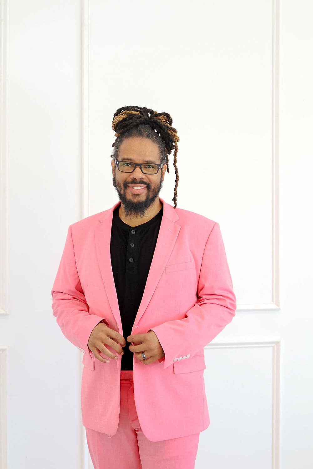 Gregory Rutledge in his signature pink suit