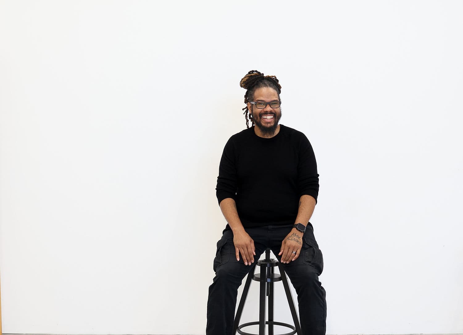 Gregory Rutledge laughing warmly